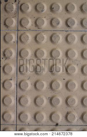 Dot sign on the floor for warning blind people
