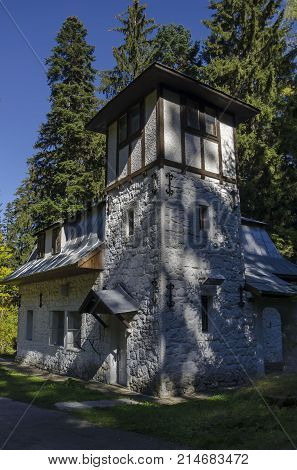 Majestic ancient  building of Hydroelectric plant in the old park Tsarska or Royal Bistritsa  near by  resort  Borovets, Rila mountain, Bulgaria