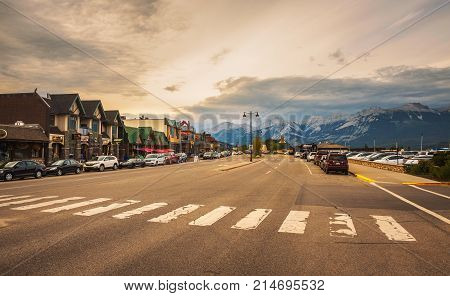 JASPER, ALBERTA, CANADA - JUNE 26, 2017 : Evening on the streets of Jasper in canadian Rocky Mountains. Jasper is located in the Athabasca River valley and is a popular tourist destination.