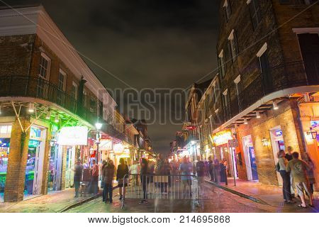 NEW ORLEANS - JUN. 1, 2017: Historic Buildings on Bourbon Street at Conti Street in French Quarter at night in New Orleans, Louisiana, USA.