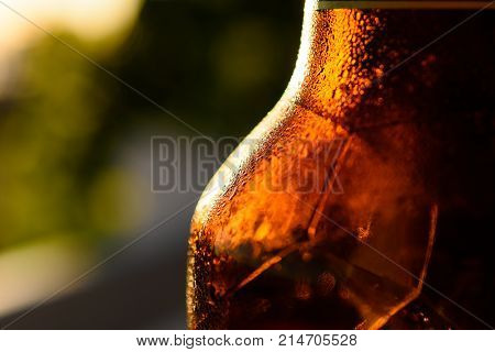 Refreshing Brown Cold Beer Bottle Covered With Condensation