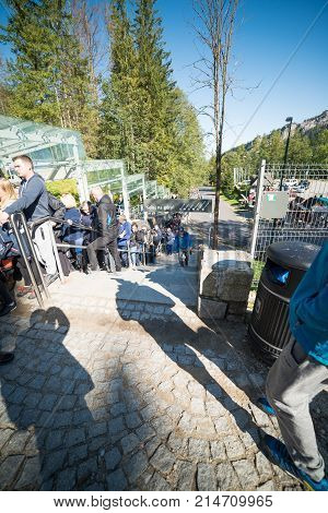 KUZNICE POLAND-SEPTEMBER 18: a large queue of people standing for tickets to the cable car on the Kasprowy Wierch Septomer 18 2017 in Zakopane Poland.