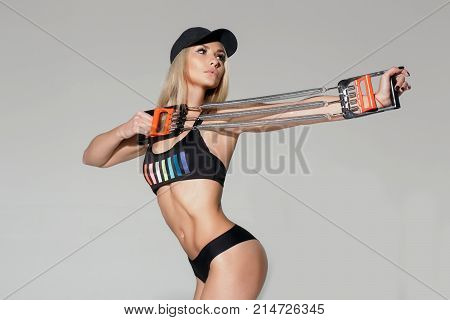 Pretty Sporty Girl Athlete Holding Resistance Band