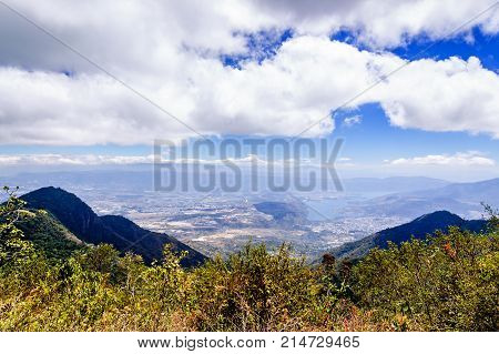 Hilltop view of valley & Lake Amatitlan near Antigua, Guatemala, Central America