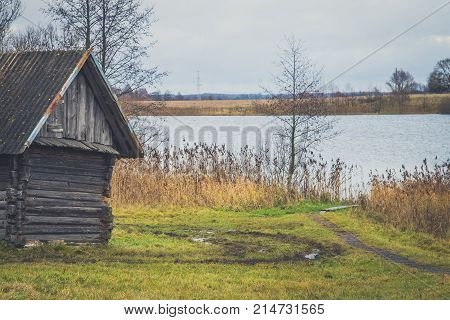 Old Wooden Bath On The Lake Shore