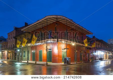 NEW ORLEANS - JUN. 1, 2017: Historic Buildings at the corner of Bourbon Street and Orleans Street in French Quarter at night in New Orleans, Louisiana, USA.