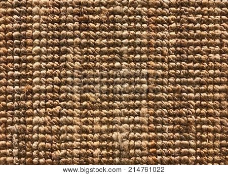 Brown woven sisal or nature fiber carpet texture and background