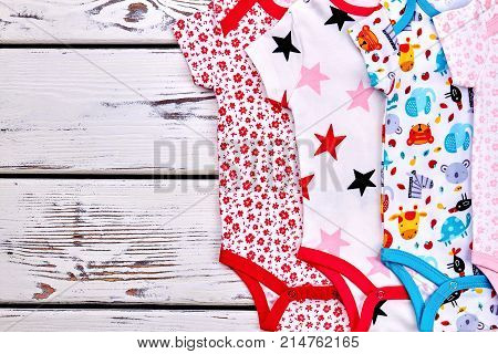 Brand collection of soft kids rompers. Newborn kids patterned cotton rompers on sale. Babies summer bodysuits as present.