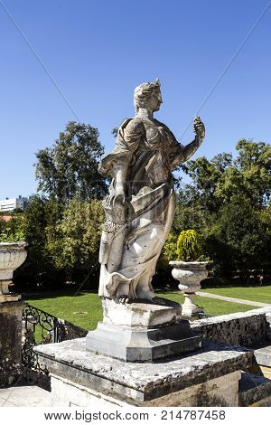 OEIRAS, PORTUGAL - September 17, 2017: Mythological statue decorating the gardens of the Palace of Marques de Pombal in Oeiras Portugal