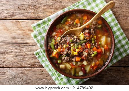 Vegetable Soup With Ground Beef Close-up In A Bowl. Horizontal Top View
