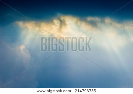 sunshine through the clouds and blue sky natural background