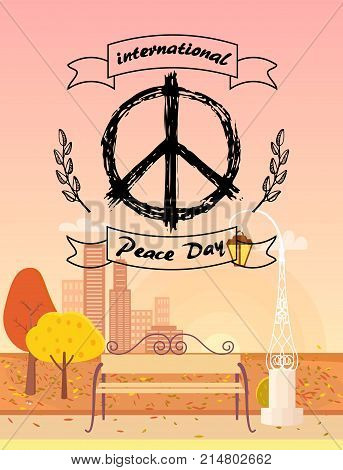 International Peace Day logo. Vector illustration with hippie symbol surrounded by spikelets on foreground of autumn city with golden yellow trees