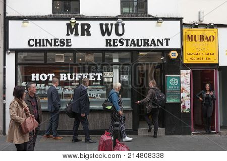 Wardour Street, London-September 6,2017: People visit Mr Wu Chinese Restaurant on Wardour Street on September 6, 2017 in London United Kingdom