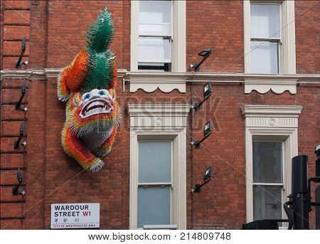 Wardour Street, London-September 62017: Chinese Dragon on the wall on China town on the Wardour Street on September 6 ,2017 in London, United Kingdom