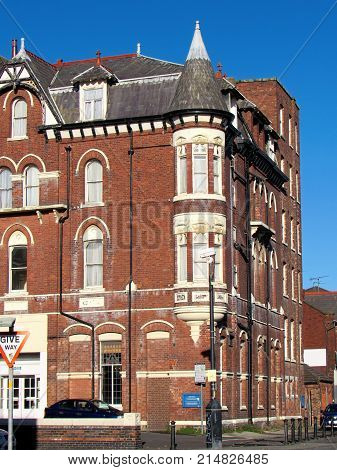 Old Red Building At The Corner In Southport