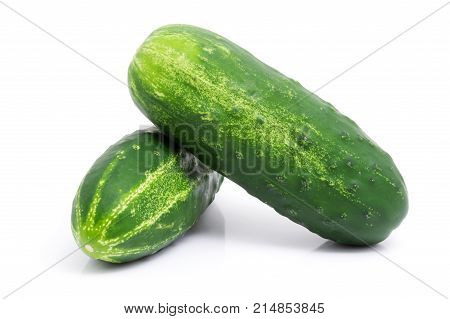 Fresh green cucumbers isolated on white background