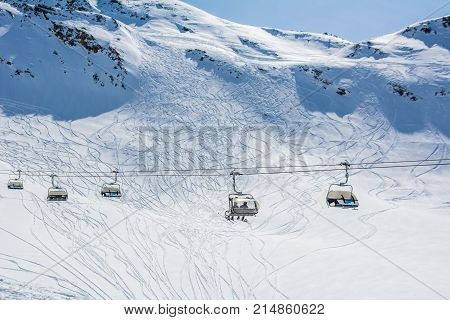 Ski and cable car on the ski resort in Austria Alps. Winter landscape.