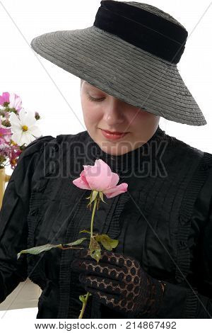 a young woman in vintage costume 1900s