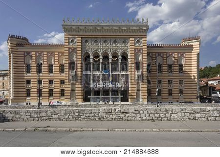 SARAJEVO, BOSNIA AND HERZEGOVINA - AUGUST 18 2017: Main facade of Sarajevo City Hall building known as Vijecnica