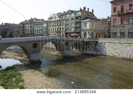 SARAJEVO, BOSNIA AND HERZEGOVINA - AUGUST 19 2017: Ponte Latino bridge in Sarajevo famous for the beginning of the first world wai on Miljacka river