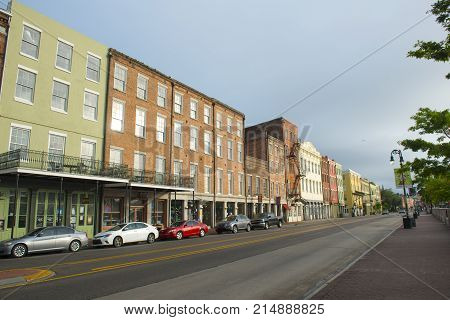 NEW ORLEANS - MAY. 31, 2017: Historic Buildings on North Peters Street between Bienville Street and Iberville Street in French Quarter in New Orleans, Louisiana, USA.