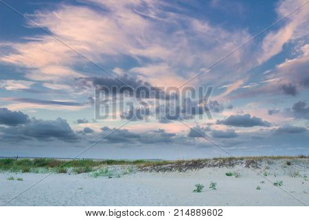 Empty Sea Coast Beach View With Sunset Cloudy Sky