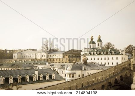 Panoramic view of the distant and near caves of Kiev Pechersk Lavra monastery in Kiev, Ukraine. Kiev-Pechersk Lavra. Color toning. Old photo style.