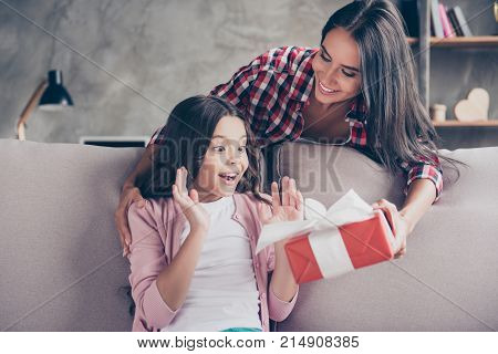 Dreams Come True On Birthday! Here You Are A Present! Young Charming Mother In Casual Clothes Is Giv