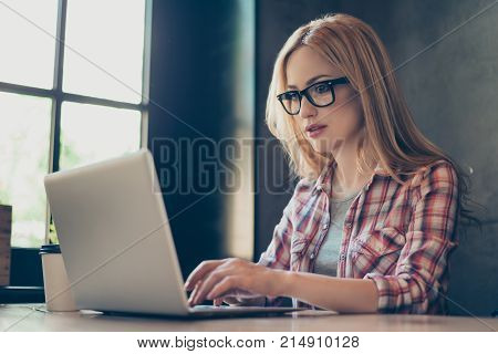 Close Up Portrait Of Young It Person In Glasses And Checkered Shirt Looking At Screen Of Computer, T