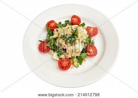 Kinoa on a plate on a white background isolation
