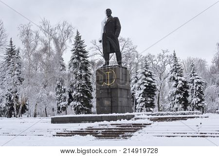 Monument to the communist leader Lenin in a snow-capped city. Makeevka Ukraine