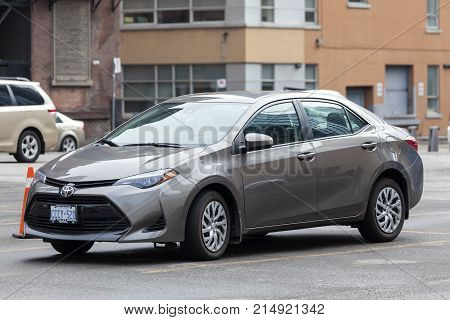 Toronto Canada - Oct 14 2017: Eleventh-generationToyota Corolla on a parking lot in the city of Toronto. Toyota Corolla is one of the best-selling cars in the world.