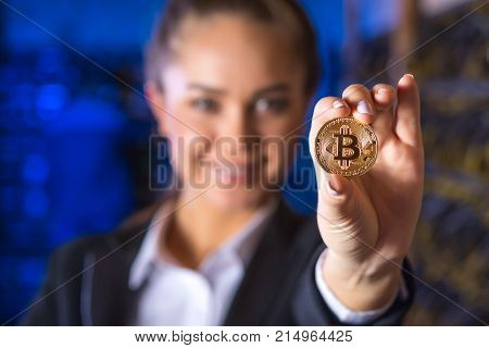 coin bitcoin cryptocurrency hold hand blured female