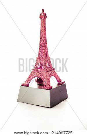 Paris tourism concept photo. Eiffel tower symbol of French. Eiffel tower keychains. Eiffel tower statue. Frenc Statue souvenir from Paris.. White background.