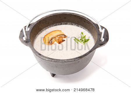 Mushroom Soup In Brutal Rustic Black Metal Pot On White