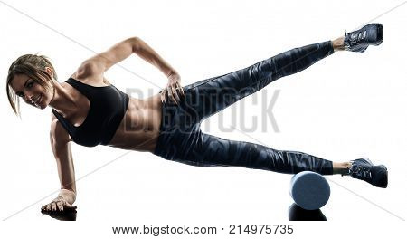 one caucasian woman exercising pilates fitness foam roller exercises isolated  silhouette on white background