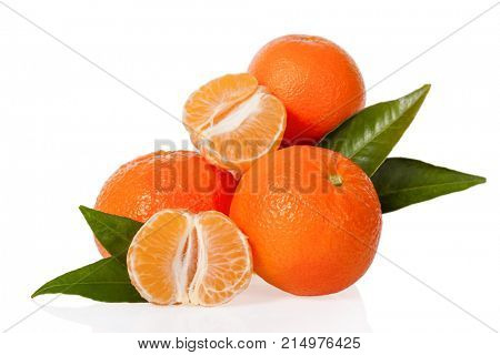 Orange Mandarines, Clementines, Tangerines or small oranges with one peeled and cut in half with leaves isolated on white background, cut out or cutout