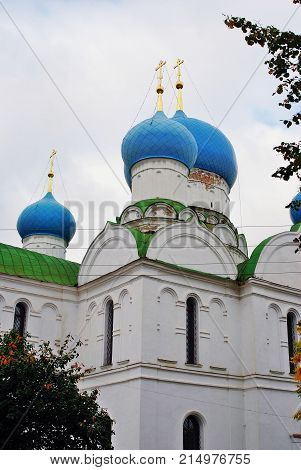 Monastery of the Epiphany in Uglich, Russia. Women's monastery. New Epiphany cathedral. Blue sky with clouds background.