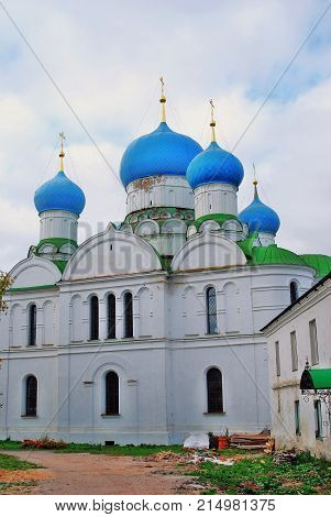 Monastery of the Epiphany in Uglich, Russia. Women's monastery. New Epiphany cathedral. Blue sky with clouds background.