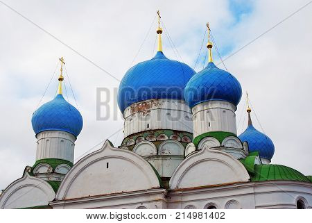 Monastery of the Epiphany in Uglich, Russia. Women's monastery. New Epiphany cathedral. Blue sky with clouds background.