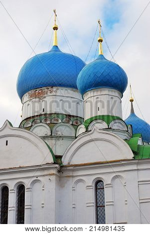 Monastery of the Epiphany in Uglich, Russia. Women's monastery. New Epiphany cathedral. Blue sky with clouds background.