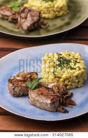 Roasted Pork Fillet And Spaetzle In A Plate