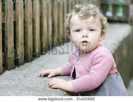 Little Girl Looking At Camera