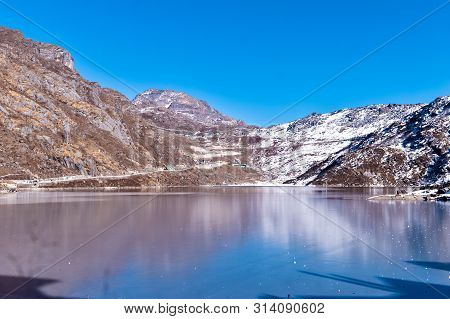 Tsomgo Lake (tsongmo Or Changu Lake) Frozen During Winter Season. It Is A Glacial Lake In East Gangt