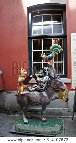 Bremen, Germany - 07 23 2015 - View Of Statue Of The Town Musicians In Medieval Street Schnoor In Th