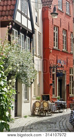 Bremen, Germany - 07 23 2015 - View Of Medieval Street Schnoor With Half-timbered Houses In The Cent