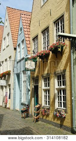 Bremen, Germany - 07 23 2015 - Picturesque View Of Medieval Street Schnoor With Half-timbered Houses