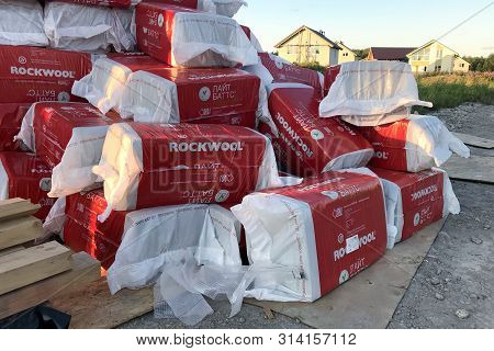 St. Petersburg, Russia - July 28, 2019: A Large Pile Of Closed Packages With Mineral Insulation Rock