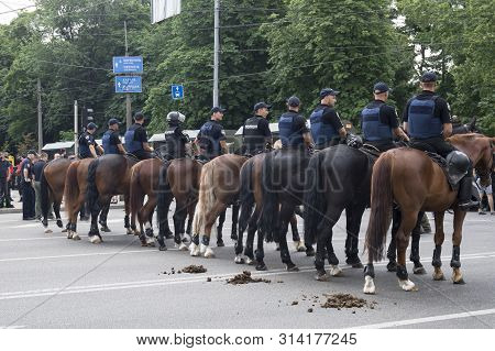 Kyiv, Ukraine - June 23, 2019. Mounted Police On The Road In The City