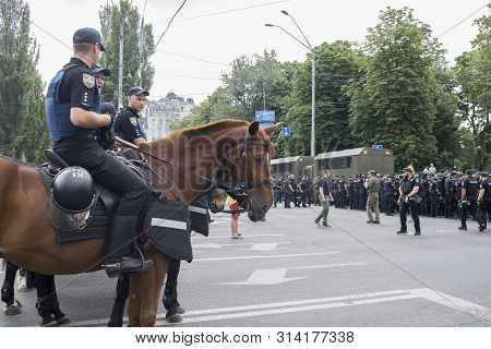 Kyiv, Ukraine - June 23, 2019. Mounted Police On The Road In The City
